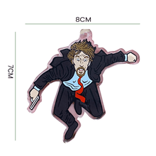 Load image into Gallery viewer, Die Hard Advent Calendar - Hans Gruber Falling off off Nakatomi Plaza