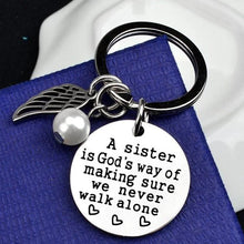 Load image into Gallery viewer, A Sister is God&#39;s Way of Making Sure We Never Walk Alone Keychain
